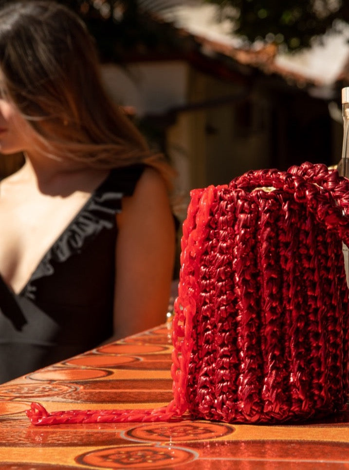 
                  
                    Roundy Mini Bucket Bag in Metallic in Red
                  
                