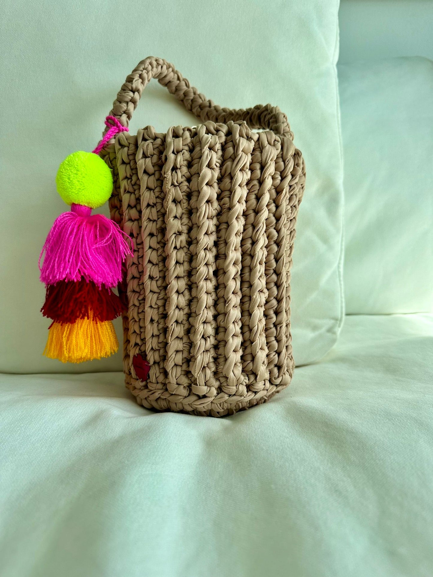 
                  
                    Roundy Mini Bucket Bag in Beige
                  
                