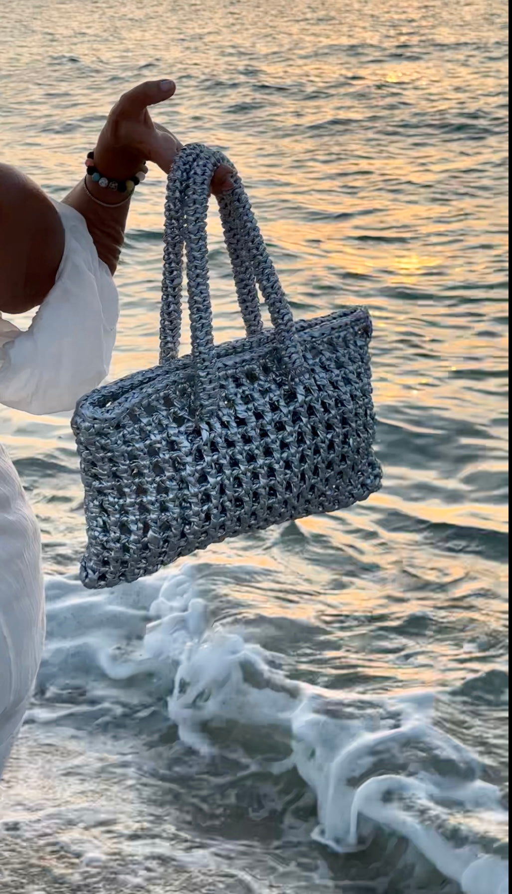 
                  
                    Luna Crochet Shoulder Bag in Metallic Silver
                  
                