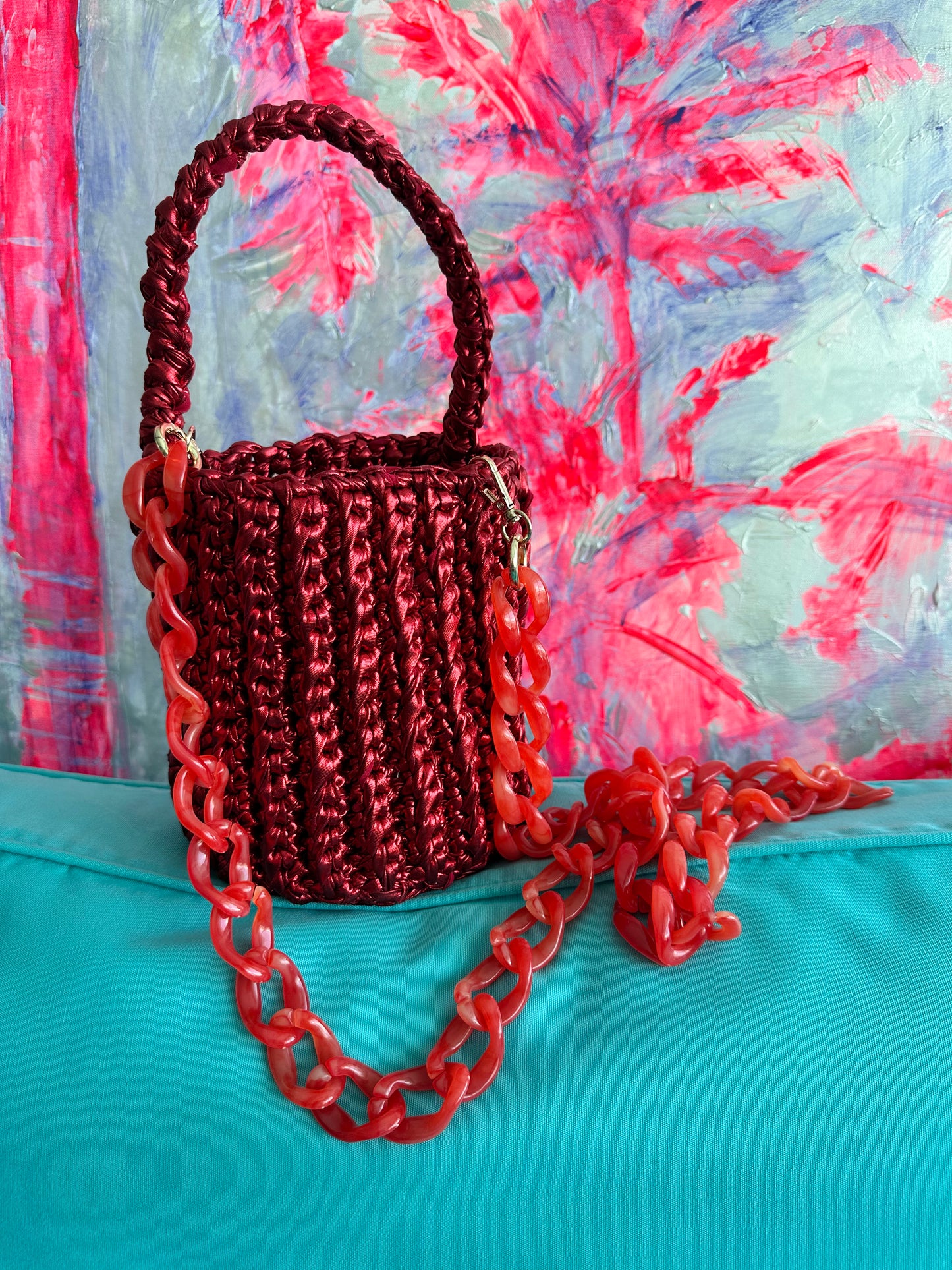 
                  
                    Roundy Mini Bucket Bag in Metallic in Red
                  
                