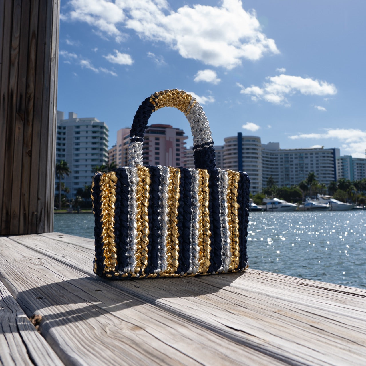 
                  
                    Rajas Stripes Small Tote Bag in Navy Blue + Metallic Gold + Silver
                  
                