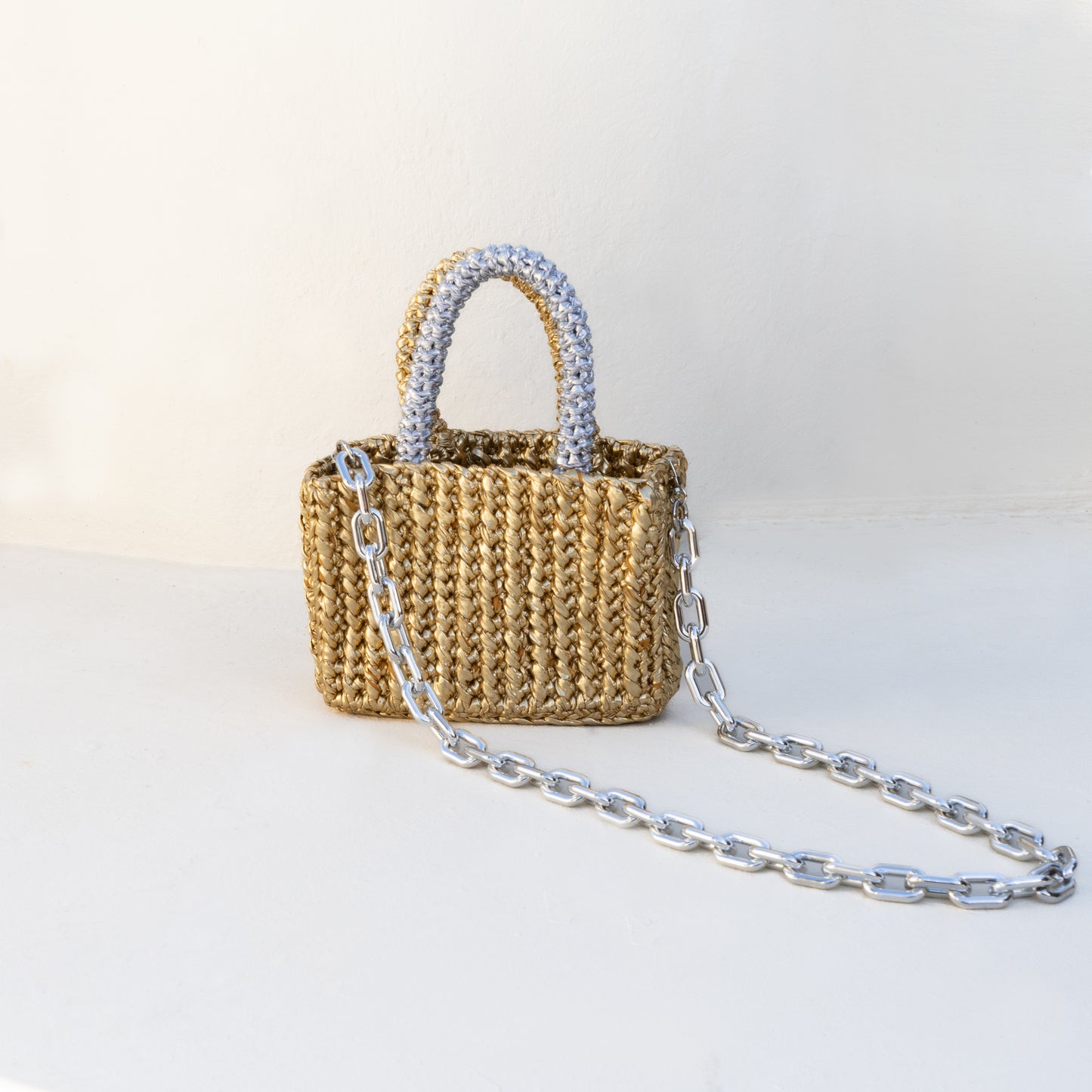 
                  
                    Rajas Small Tote Bag in Metallic Gold + Silver
                  
                