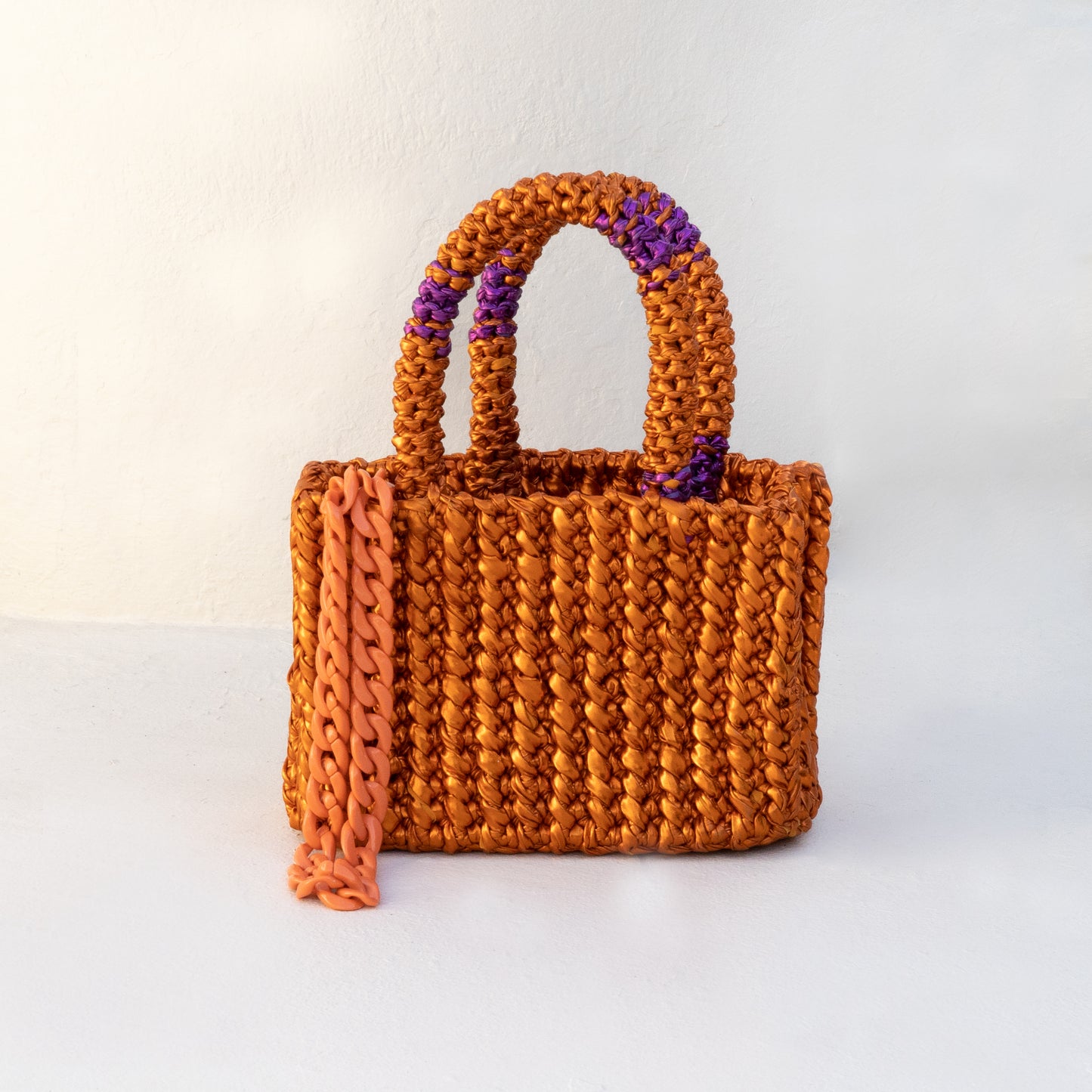 
                  
                    Rajas Small Tote Bag in Metallic Orange + Purple
                  
                