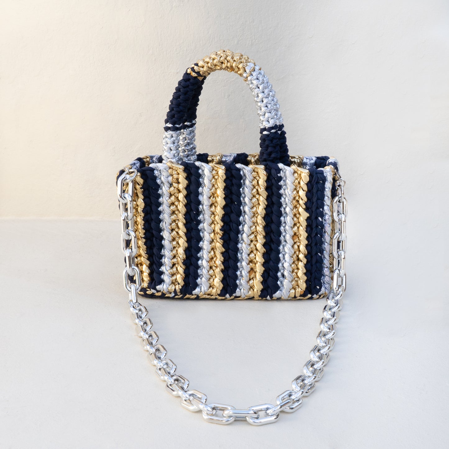 
                  
                    Rajas Stripes Small Tote Bag in Navy Blue + Metallic Gold + Silver
                  
                